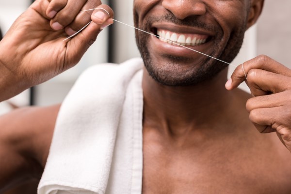Here’s How to Use Dental Floss For the Best Results